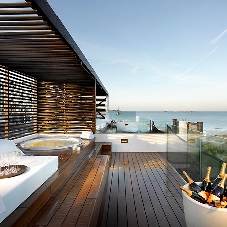 Hard Rock Hotel Ibiza Playa d'en Bossa Exterior foto The rooftop bar at the hotel